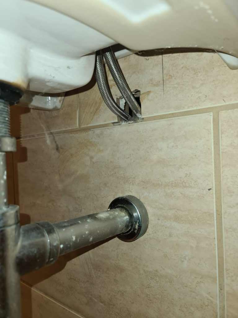 plumbing system under the sink